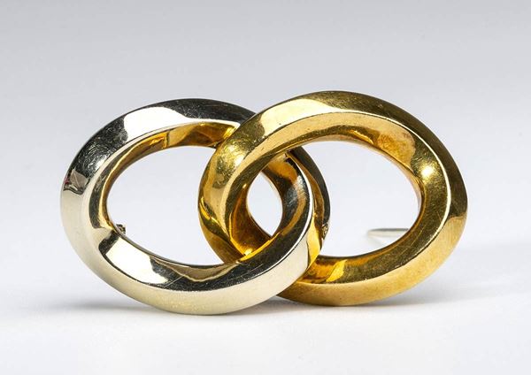 POMELLATO: spilla ad anelli in oro 