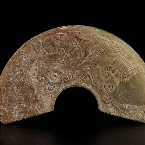 A GREEN JADE ARCHAISTIC CARVING