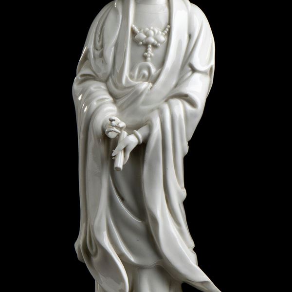 A 'BLANC DE CHINE' PORCELAIN GUANYIN