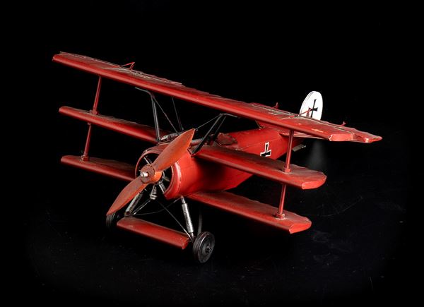 Handcrafted Fokker triplane model in painted iron
