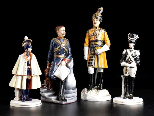 Lot of four figurines of various subjects and sizes
