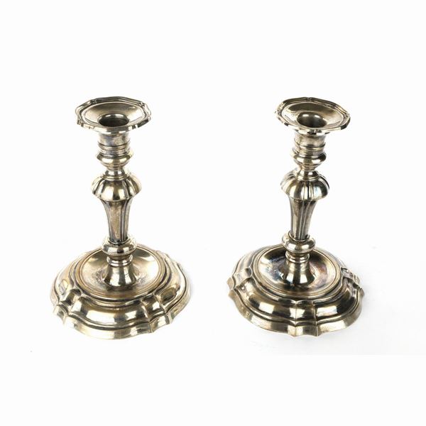 Pair of 800/1000 silver candlesticks