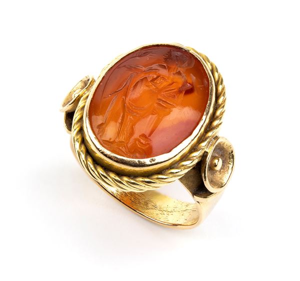 Archaeological-style yellow gold ring with engraved carnelian 