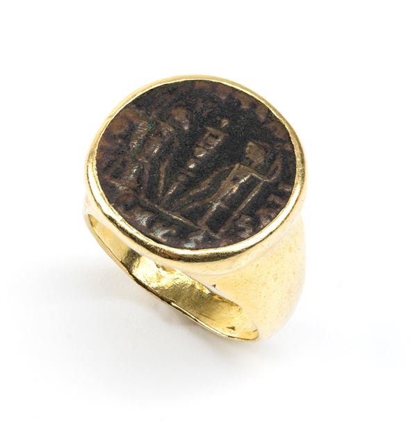 Gold ring with coin
