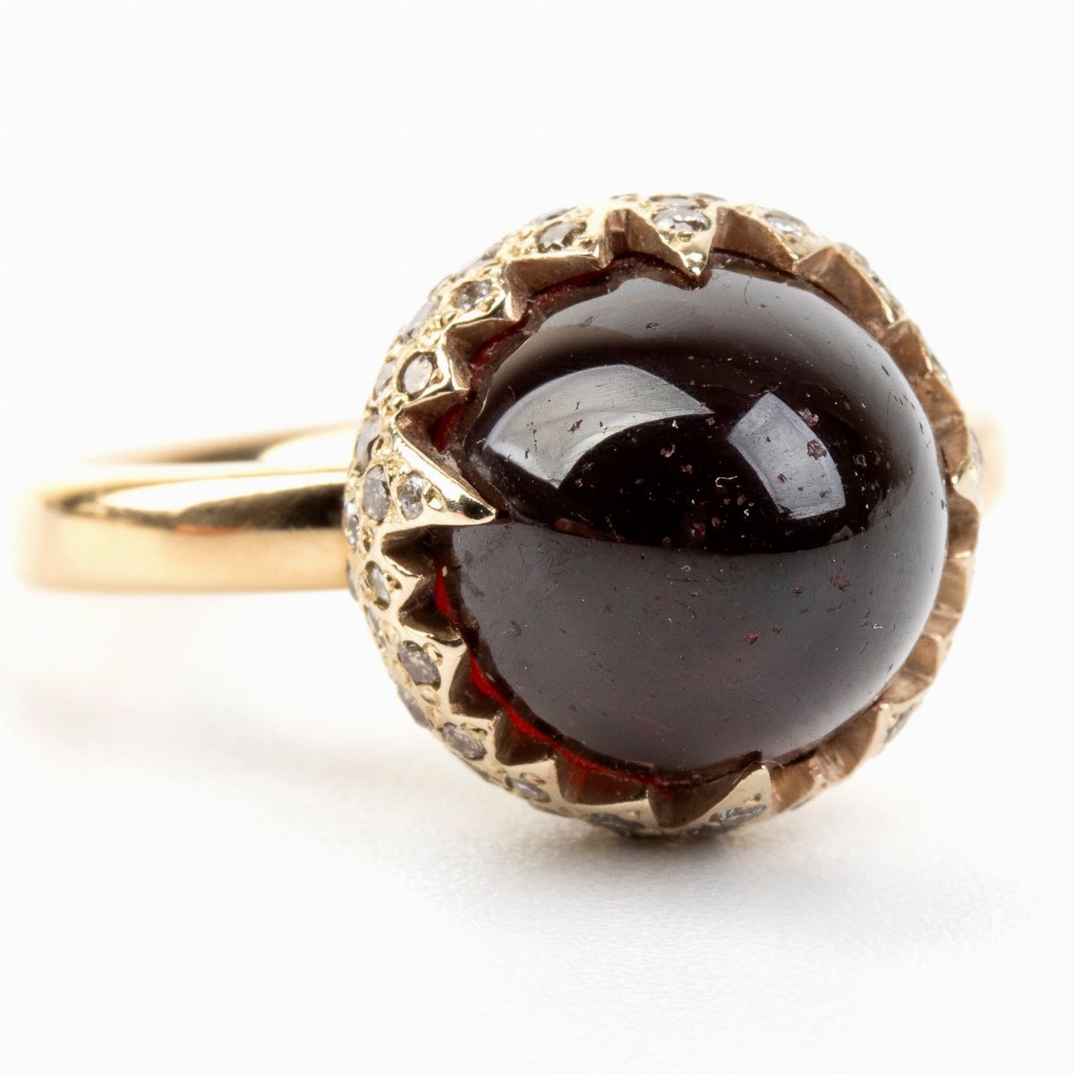 Pomellato: Anello "chimera" in Oro con Granato e Diamanti Brown