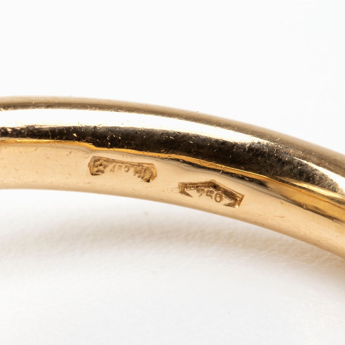 Pomellato: Anello "chimera" in Oro con Granato e Diamanti Brown