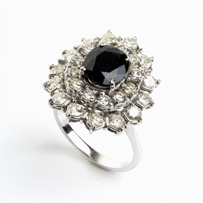 Anello in Oro Bianco con Zaffiro e Diamanti