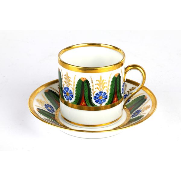 Polychrome porcelain cup and saucer