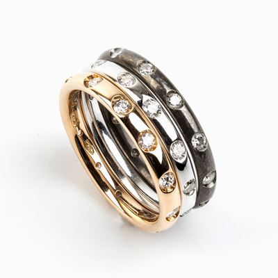 Pomellato, Collezione Lucciole: Anelli in Oro Titanio e Diamanti