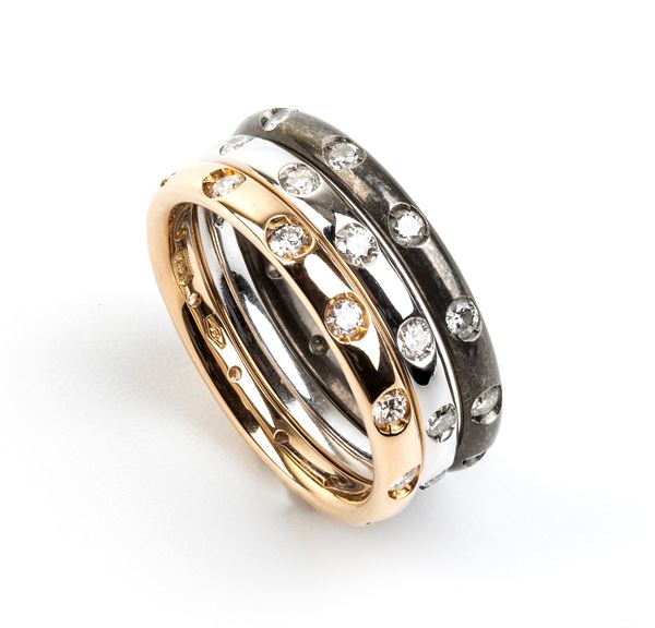 POMELLATO, collection Lucciole: titanium gold diamond rings 