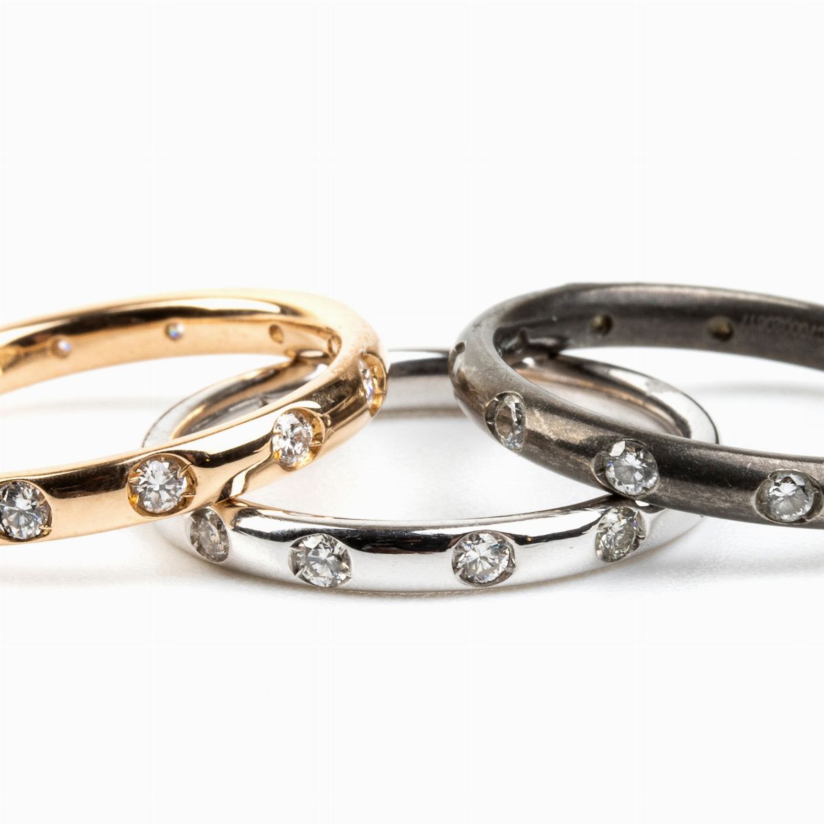 Pomellato, Collezione Lucciole: Anelli in Oro Titanio e Diamanti