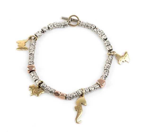 POMELLATO, collection Dodo: mini grain sterling silver pink gold bracelet, yellow gold pendant
