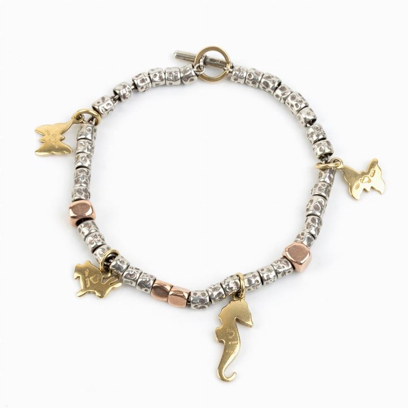 Pomellato, Collezione Dodo: Bracciale con Pepite in Argento ed Oro Rosa, Pendenti in Oro Giallo