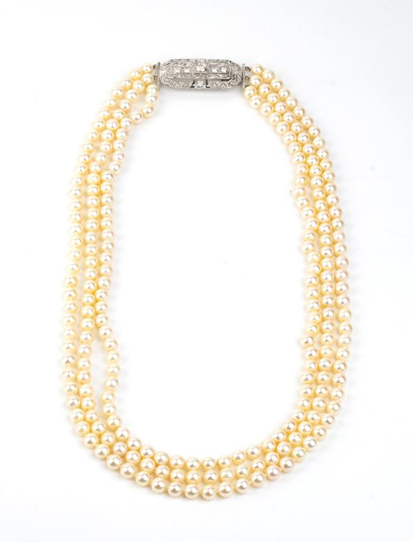 Pearl necklace diamond platinum geometric clasp 