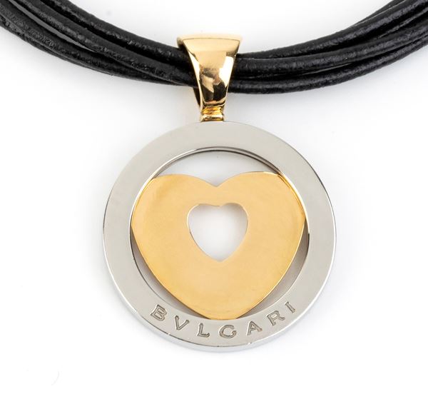 BULGARI: tondo heart gold and steel pendant