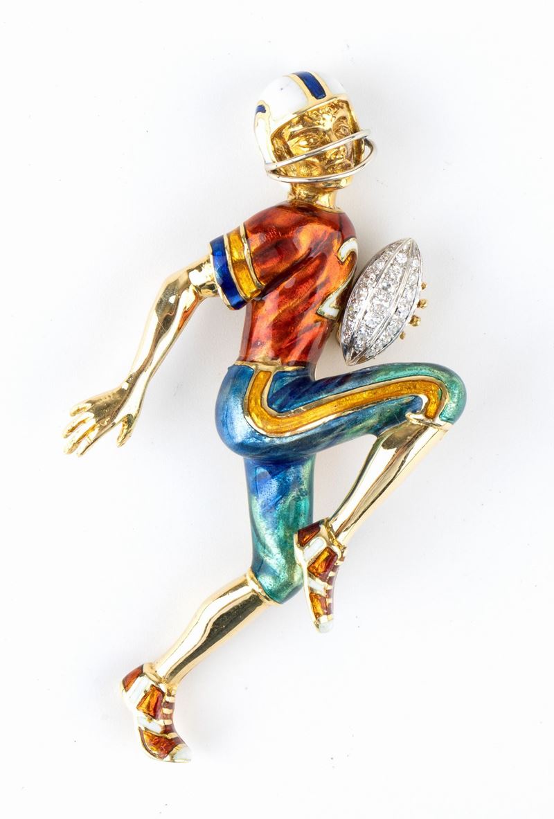 DAMIANI: spilla in oro, diamanti e smalti raffigurante giocatore di football americano