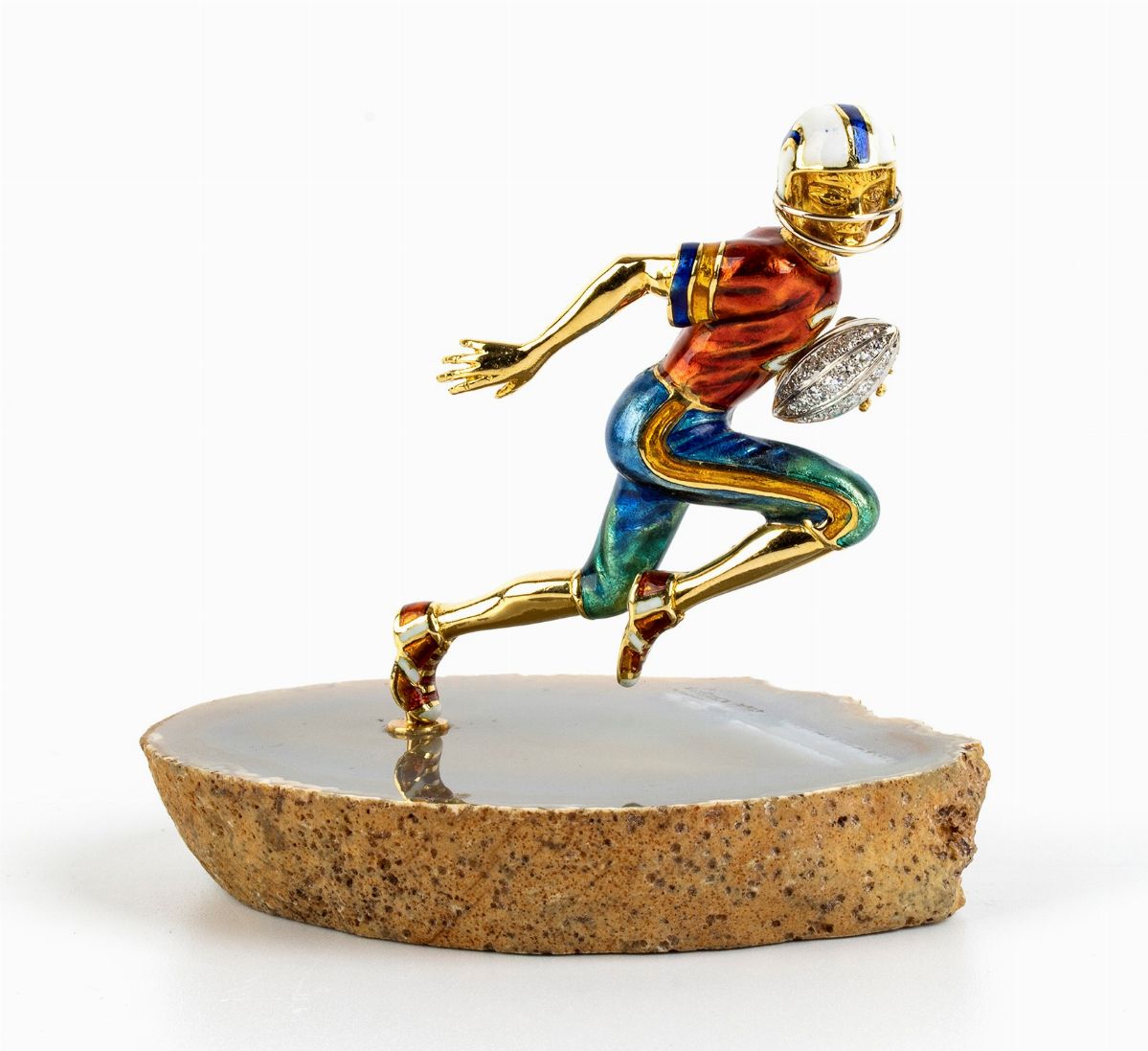 DAMIANI: spilla in oro, diamanti e smalti raffigurante giocatore di football americano