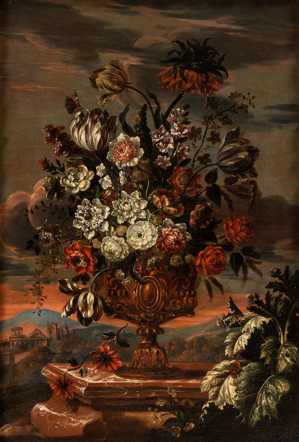 Artista fiammingo, fine XVII - inizio XVIII secolo - Bouquet of flowers on a metal vase in a landscape