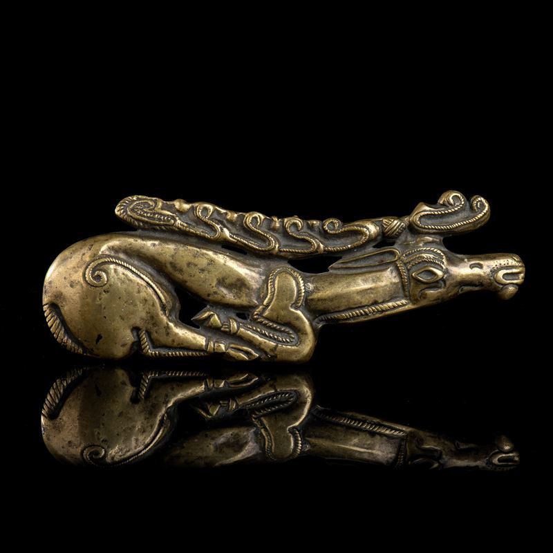 PLACCA ZOOMORFA IN BRONZO DORATO