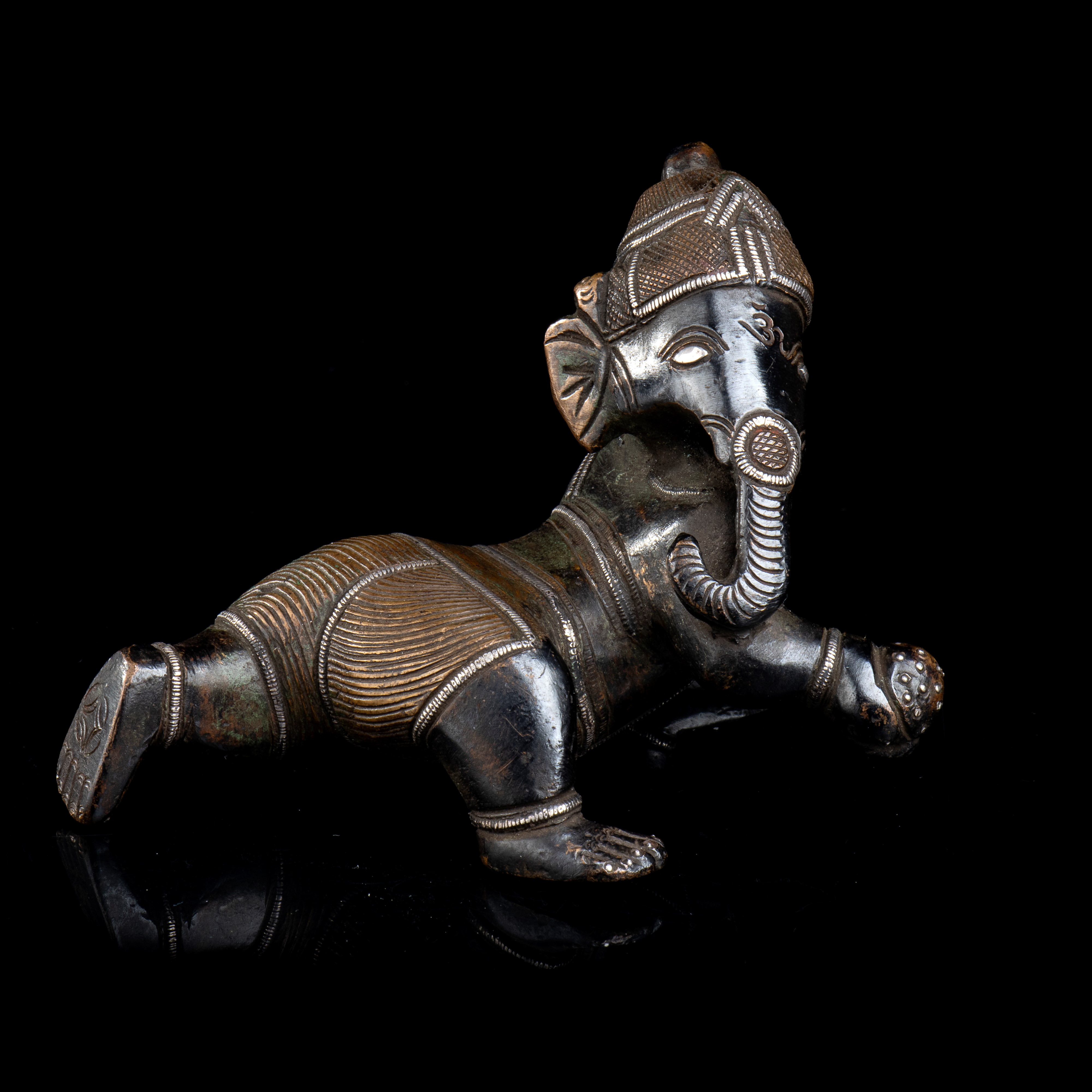 SCULTURA CON GANESHA IN BRONZO AGEMINATO IN ARGENTO