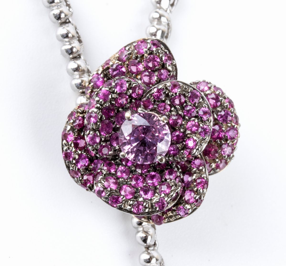 Girocollo saliscendi in oro con corindoni rosa