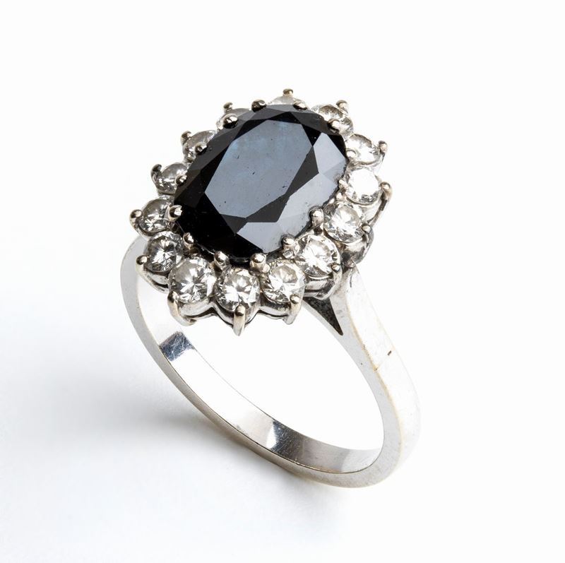 Anello in Oro con Zaffiro e Diamanti