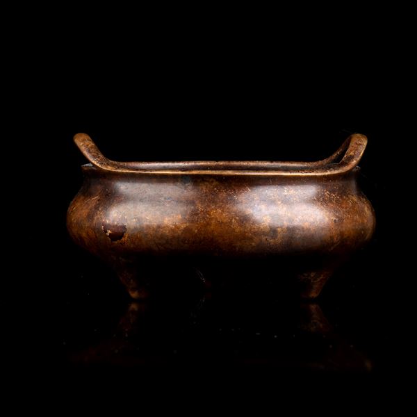 A BRONZE TRIPOD INCENSE BURNER