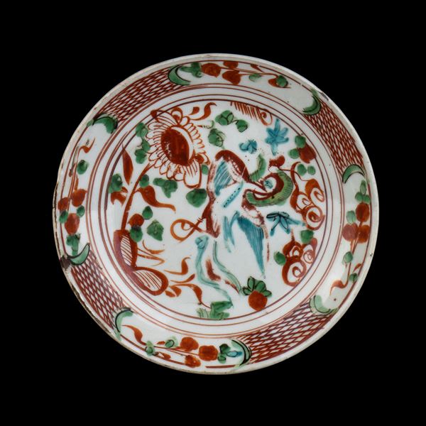 A POLYCHROME ENAMELLED 'SWATOW' PORCELAIN DISH