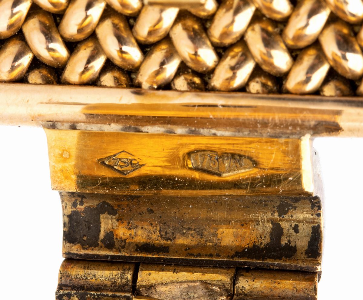 REPOSSI: bracciale a fascia in oro - Italia anni '40