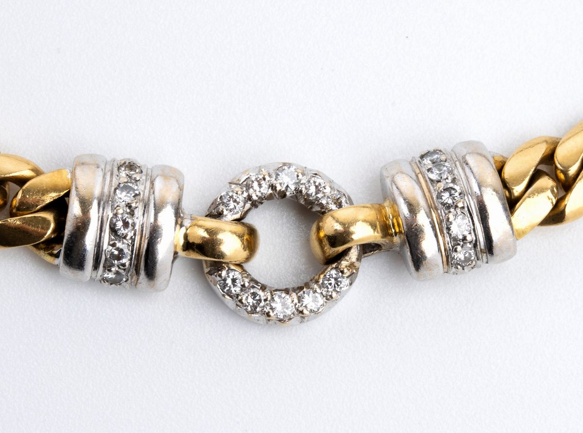 Demi parure composta da collana e bracciale in oro e diamanti
