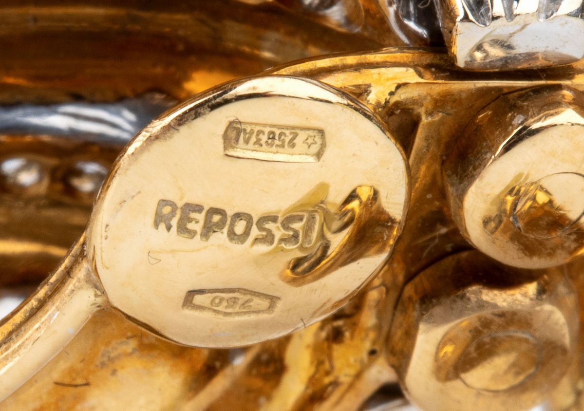 REPOSSI: spilla ed orecchini a fiocco in oro con diamanti