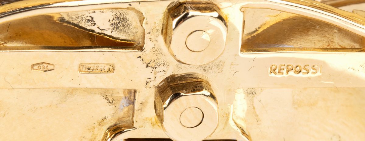 REPOSSI: spilla ed orecchini a fiocco in oro con diamanti