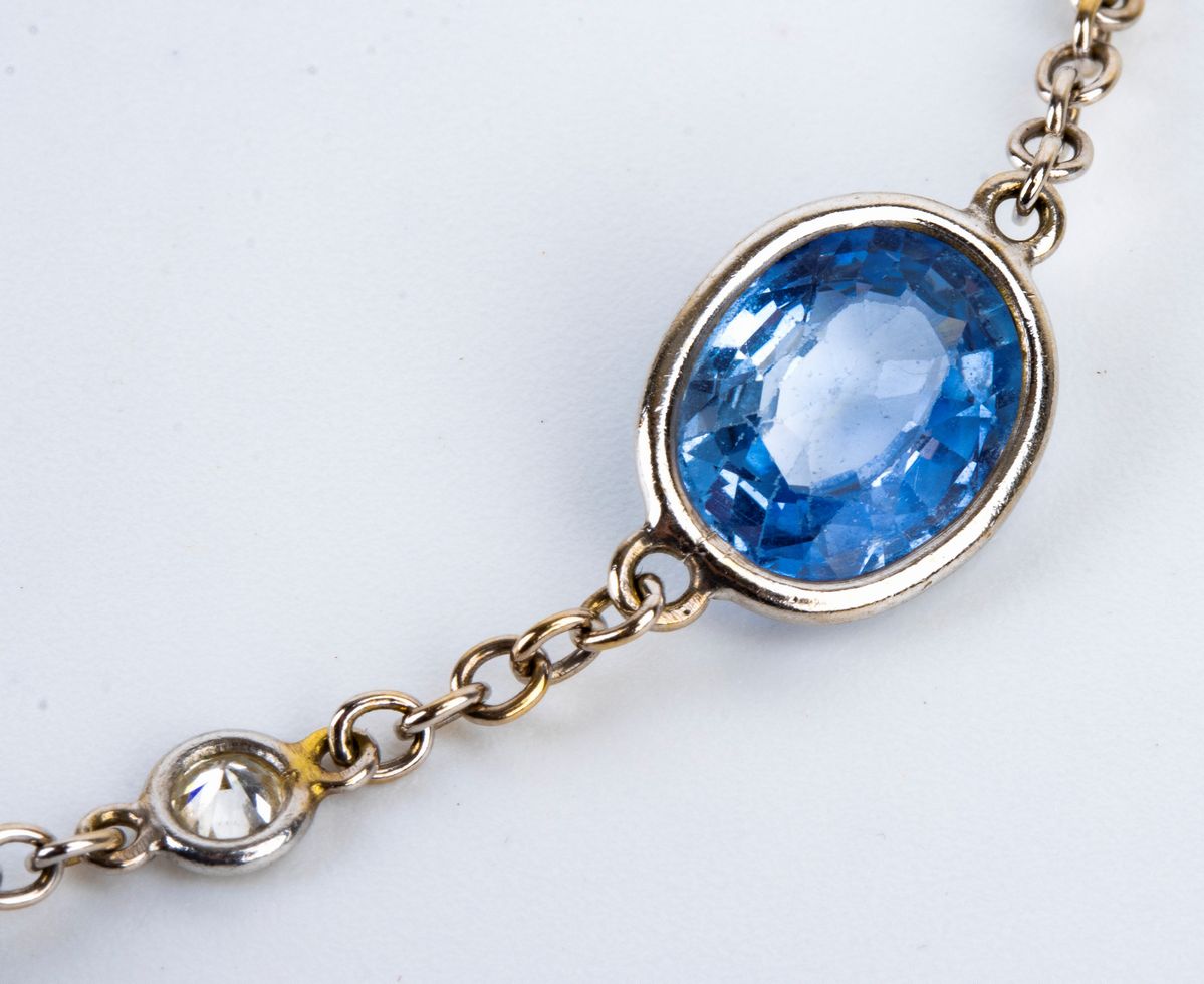 FARAONE: demi parure composta da una collana ed un paio di orecchini con zaffiri, corindoni vari ...