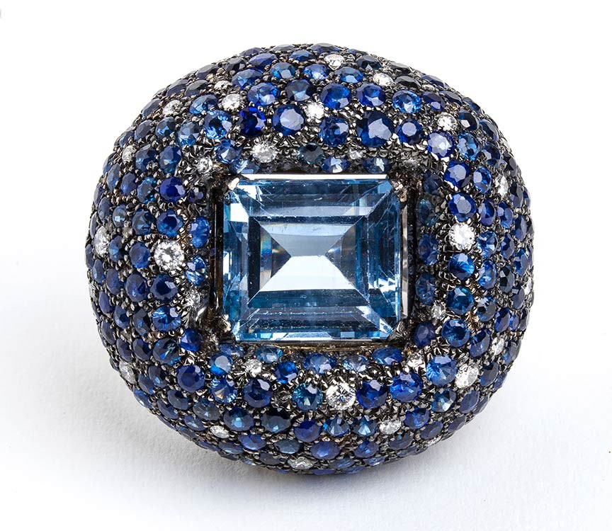 Anello a fascia in oro e topazio, zaffiri e diamanti