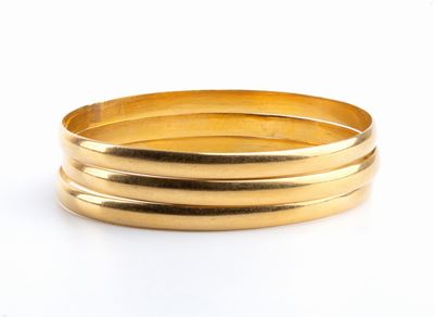 Tre Bracciali a Cerchio Rigido in Oro