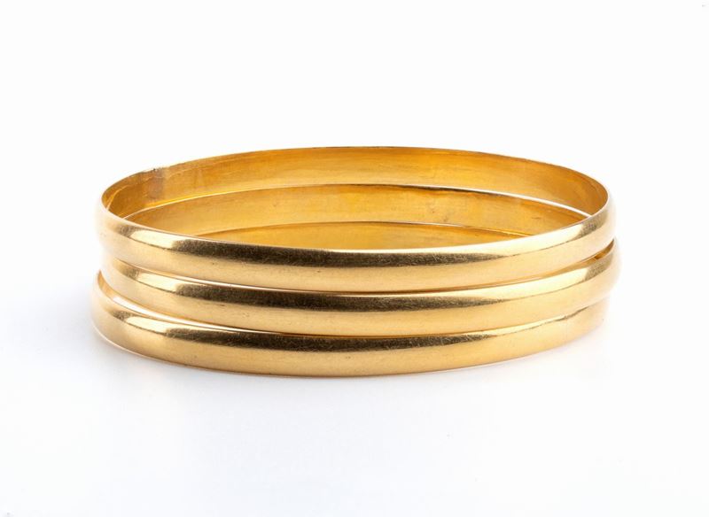 Tre Bracciali a Cerchio Rigido in Oro