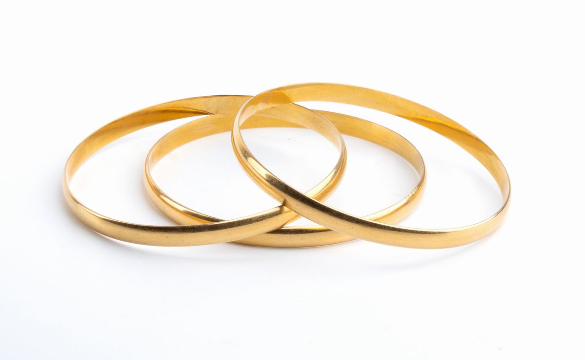 Tre Bracciali a Cerchio Rigido in Oro