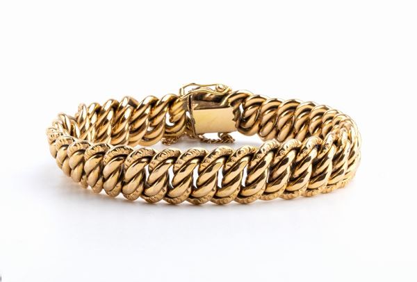 Braided link chain bracelet in yellow gold 