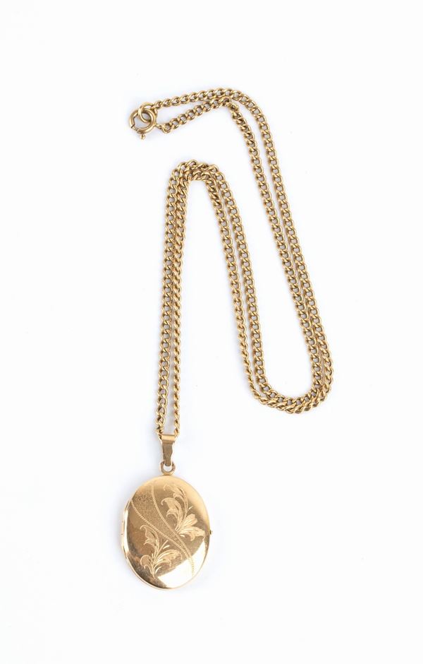 Gold necklace with a photo frame