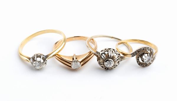 Lot of 4 gold rings with diamonds