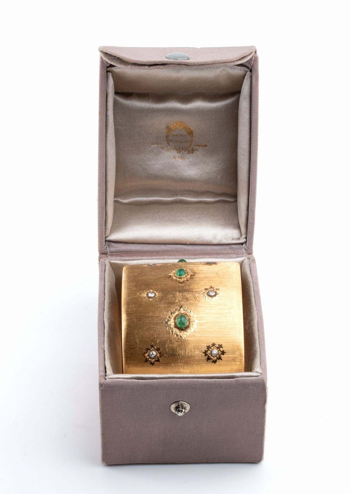 MARIO BUCCELLATI: bracciale a fascia rigida in oro con diamanti e smeraldi