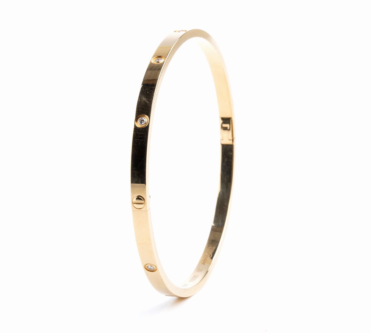 CARTIER, collezione Love: bracciale rigido in oro e diamanti