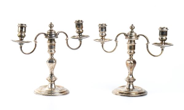 A pair of English sterling silver candelabra - London 1956