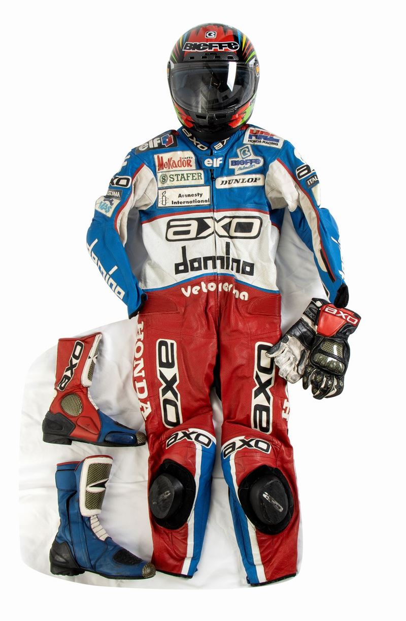 Motociclismo, Loris Capirossi , Tuta da Gara e Casco Autografati