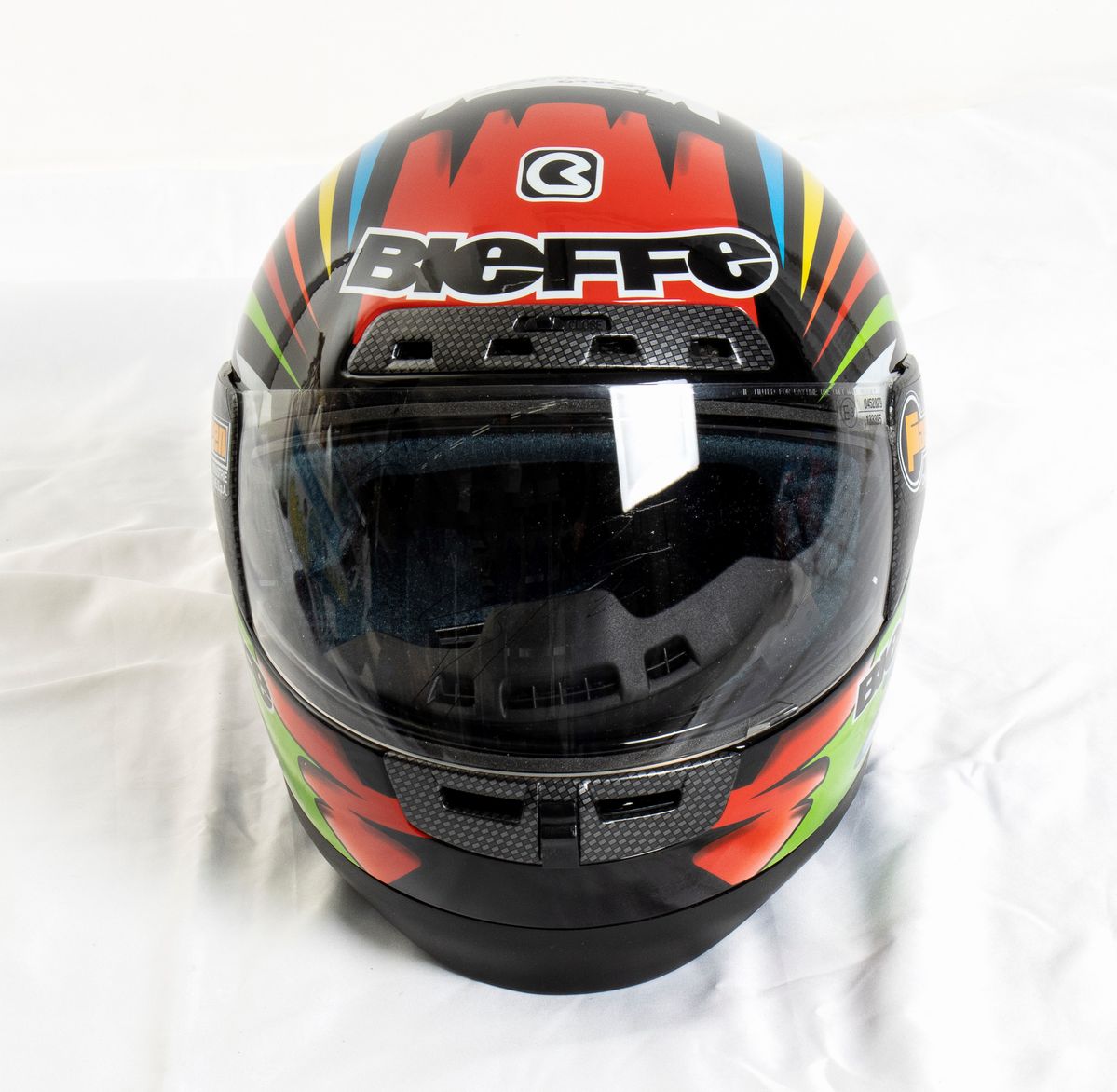 Motociclismo, Loris Capirossi , Tuta da Gara e Casco Autografati