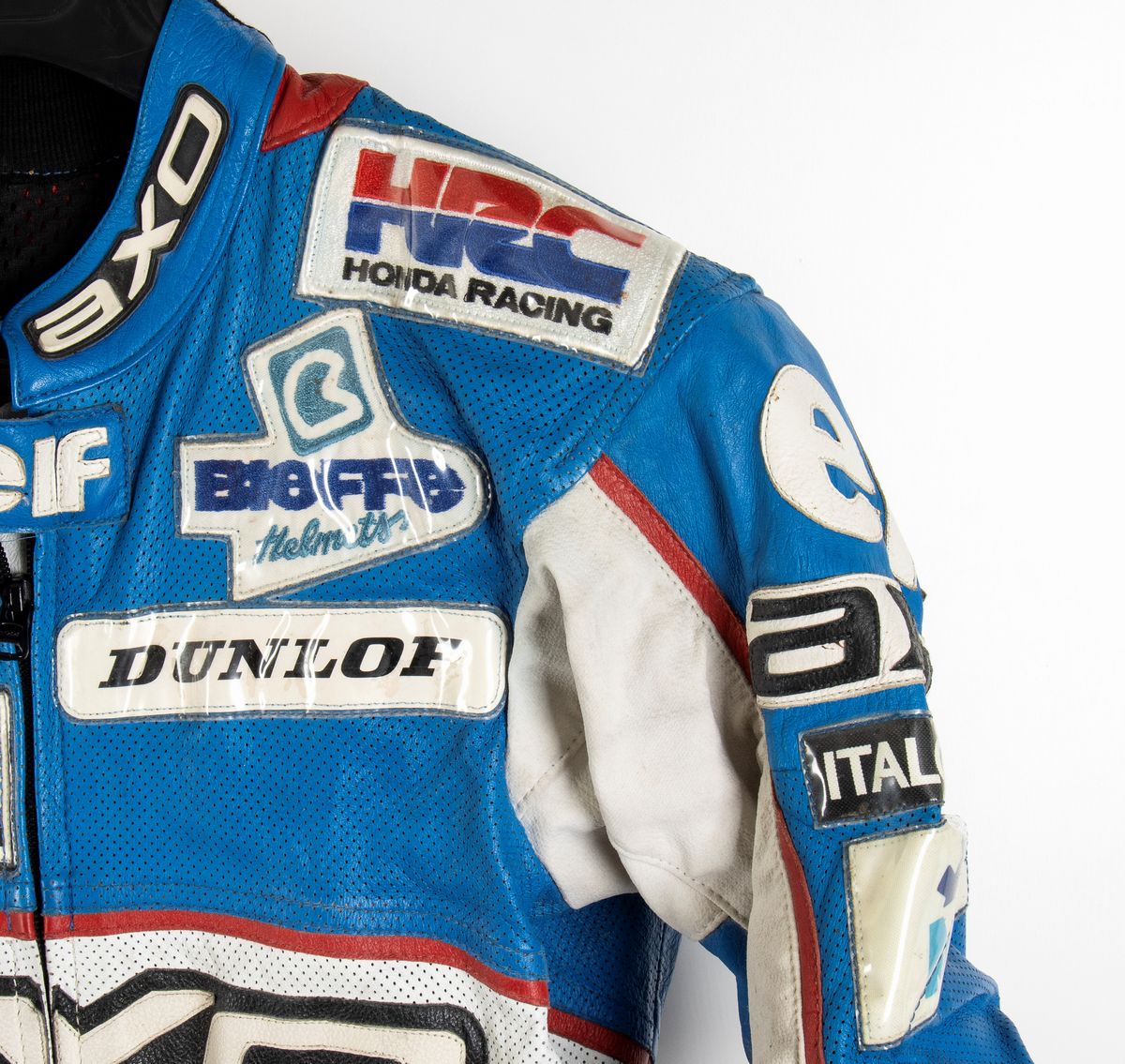 Motociclismo, Loris Capirossi , Tuta da Gara e Casco Autografati