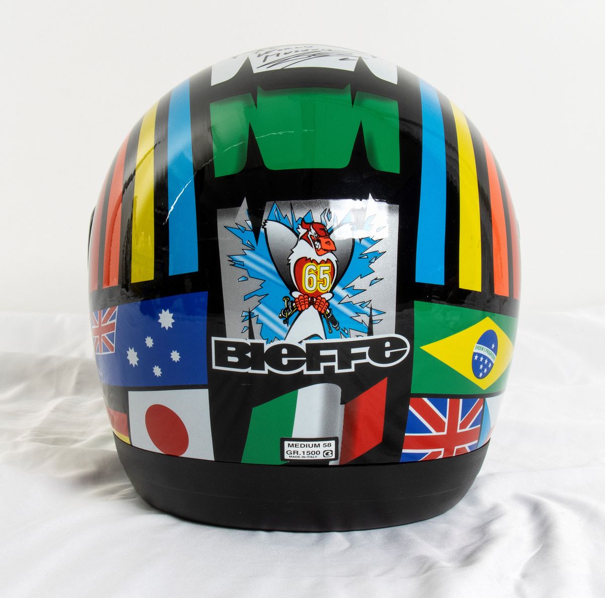 Motociclismo, Loris Capirossi , Tuta da Gara e Casco Autografati