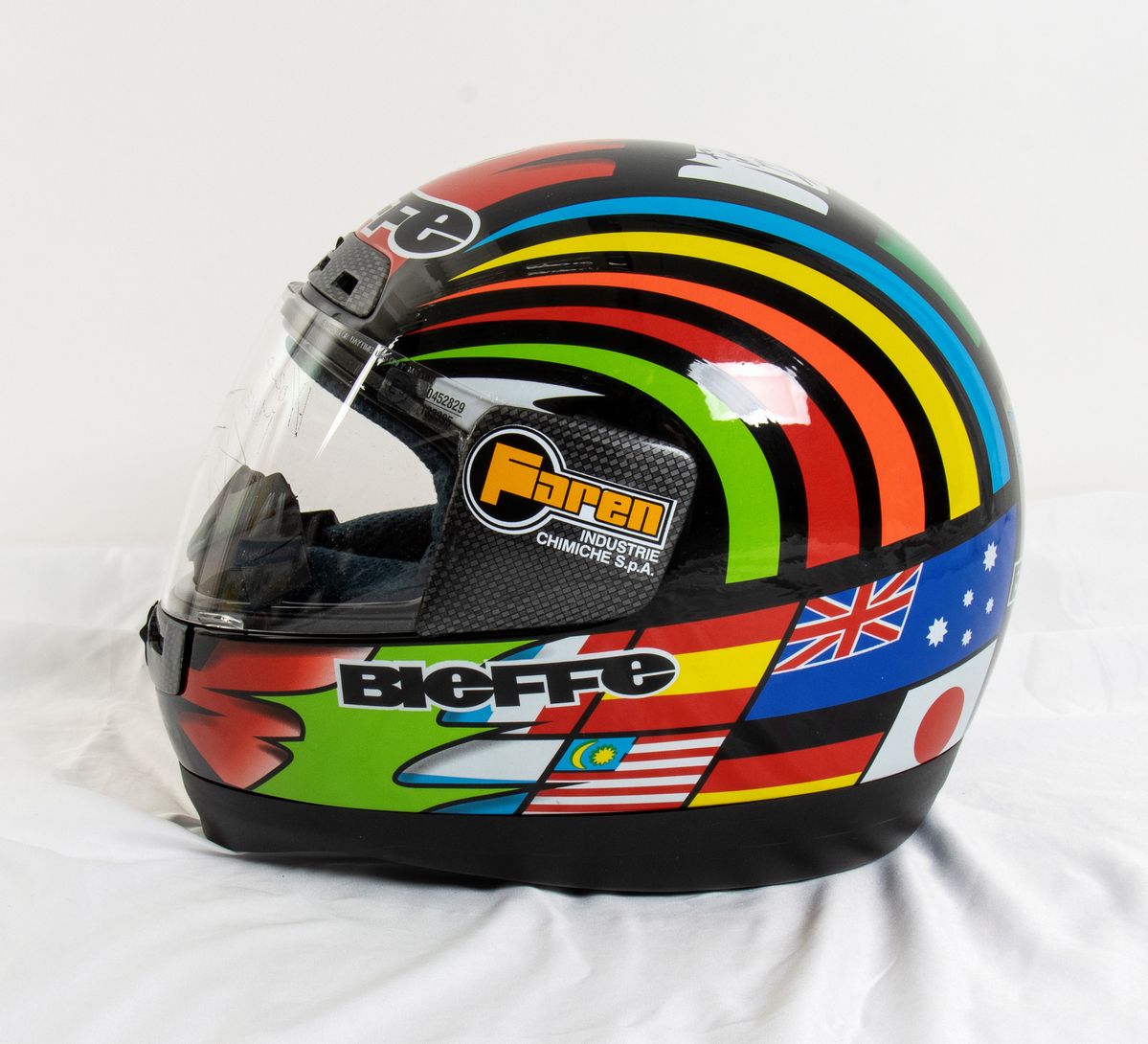 Motociclismo, Loris Capirossi , Tuta da Gara e Casco Autografati