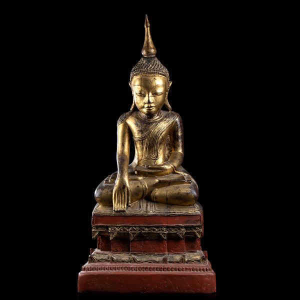 A LACQUERED AND GILT WOOD LARGE BUDDHA