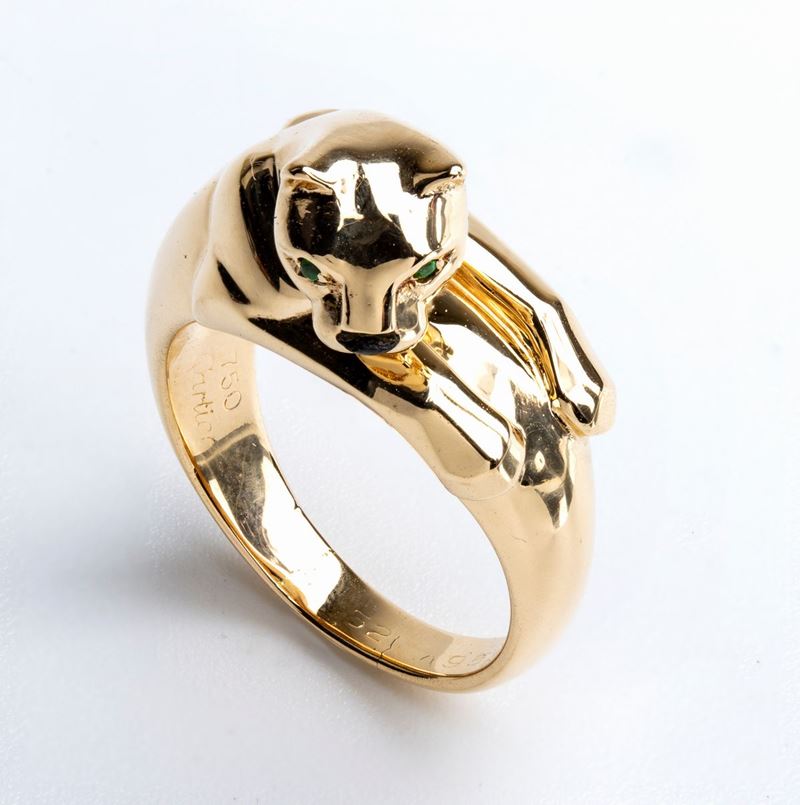 CARTIER: anello Panthère con onice e smeraldi